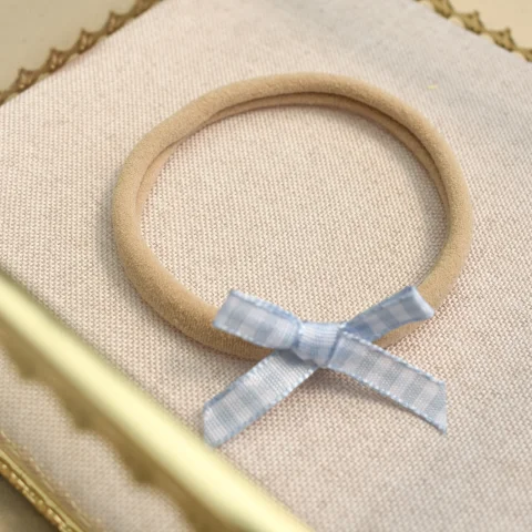 Babyhaarbandje - strik geruit blauw
