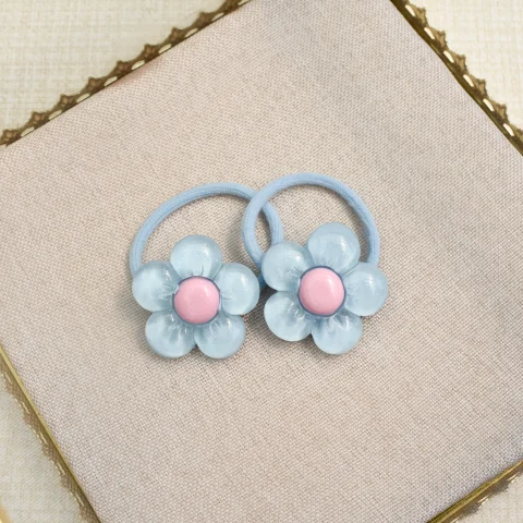 Haarelastiekjes - glitter bloem blauw/roze