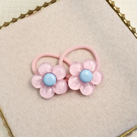 Haarelastiekjes - glitter bloem roze/blauw