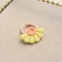 Miniatuur van Polymeerklei haarelastiekje - gele bloem